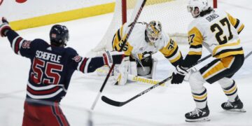 Hellebuyck’s 35 Stops Lead Jets to Victory Over Penguins, Snap 5-Game Skid